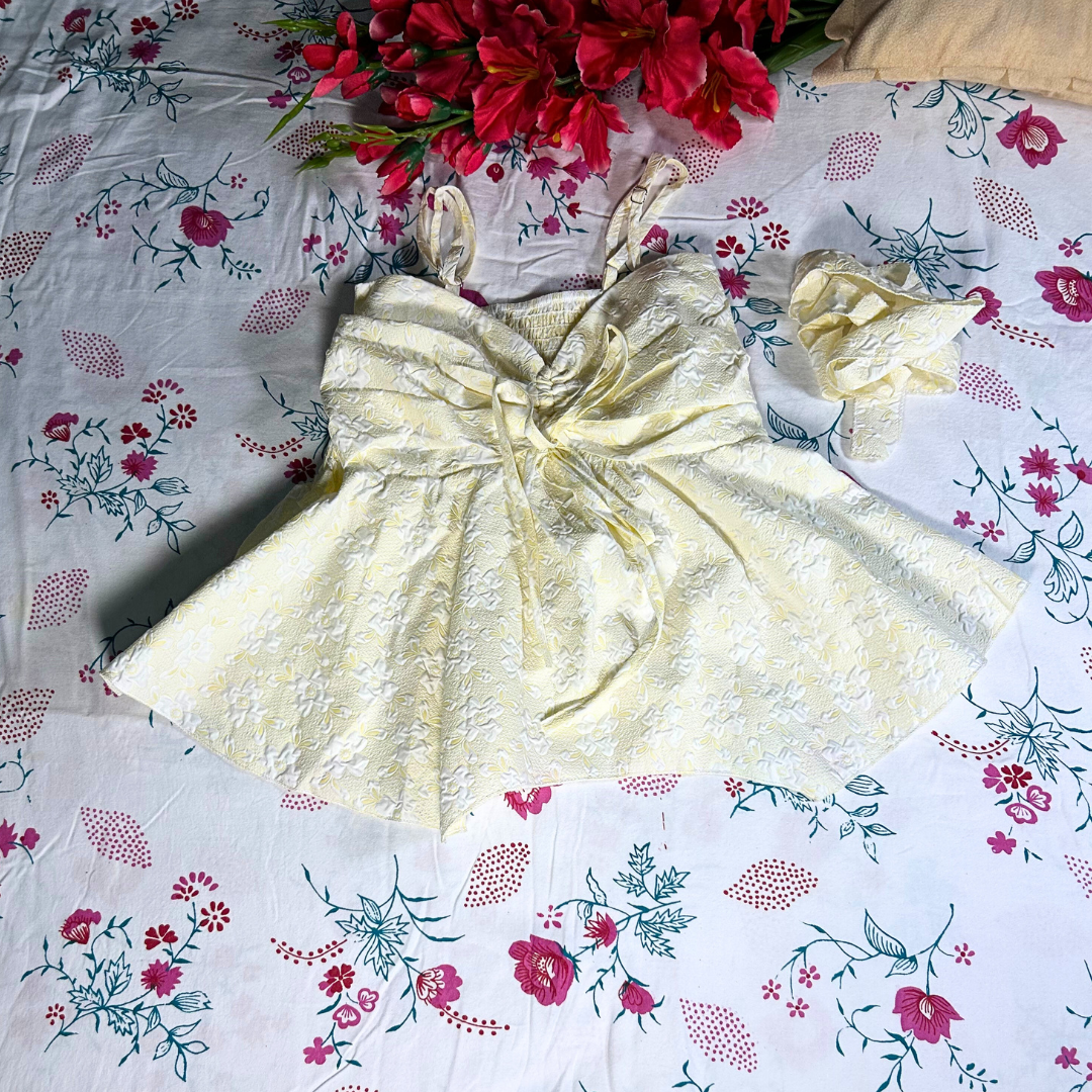 Buttercup Bloom Embroidered Peplum Top